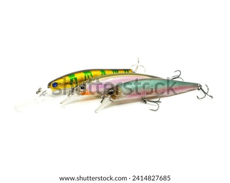 Fishing Lure fishing temptations on white background. Many Fishing Spinning, fake bait, artificial lure. Royalty-Free Stock Photo #2414827685
