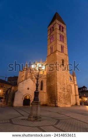 Santa Maria de la Antigua (Old) church in the old town of the city of Valladolid illuminated at night Royalty-Free Stock Photo #2414853611