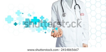 A doctor in a white coat holds blue medical crosses on an open palm. Woman doctor on medical background with copy space, blue cross, polygon background, medicine and healthcare concept