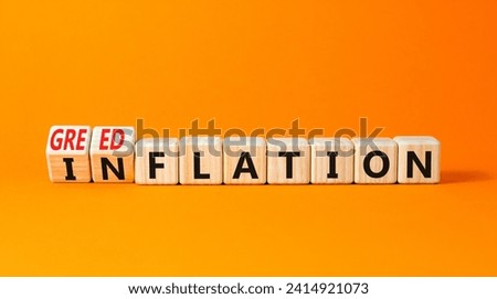 Inflation or greedflation symbol. Concept word Inflation Greedflation on beautiful wooden cubes. Beautiful orange table orange background. Business inflation greedflation concept. Copy space.