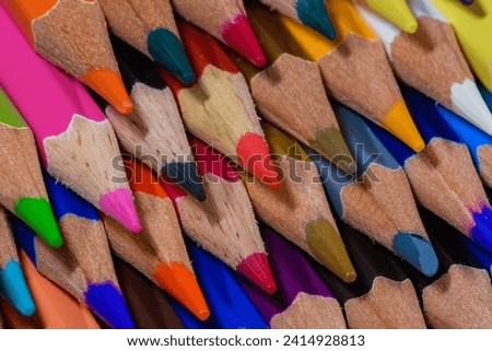Colorful background from sharpened colored pencils in macro close-up