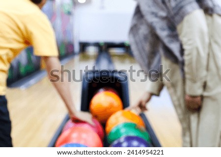 Blurred image of colorful bowling arena . Concept for blur background, competition, hobby, team, defocus