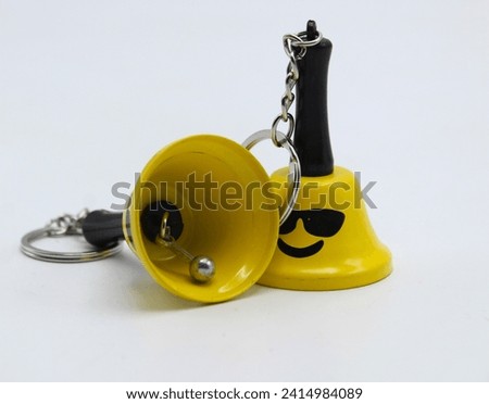 Vibrant keychain display with assorted miniatures, featuring sleek designs and vivid colors. Perfect accessory for personalizing keys or bags. Stylish and compact, ideal for trendy lifestyle visuals.