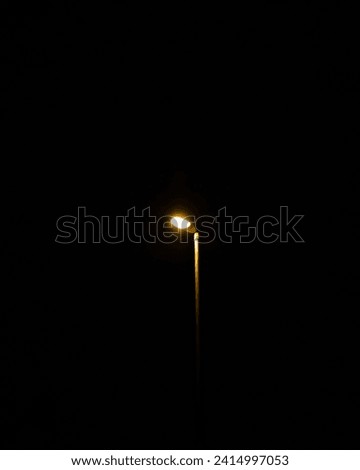 Minimal Lantern at night in town