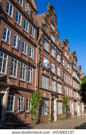 Historical houses in the Composers Quarter in Hamburg Royalty-Free Stock Photo #2415001137