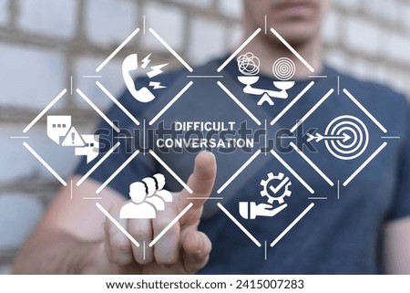 Man using virtual touch screen presses text: DIFFICULT CONVERSATION. Difficult conversation concept. Serious talk in sensible subjects at work or relationship, discuss personal issues conflict. Royalty-Free Stock Photo #2415007283