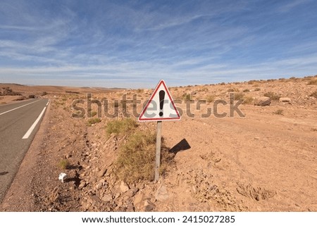 Danger Sign in the Desert, Warning Road Sign