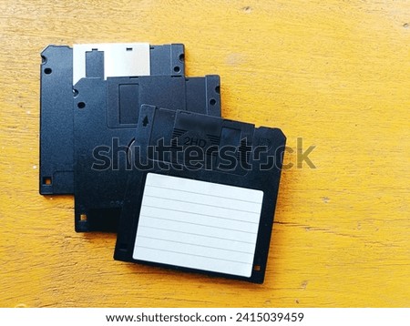 Floppy disk on a yellow background