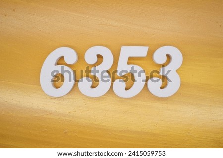 The golden yellow painted wood panel for the background, number 6353, is made from white painted wood.