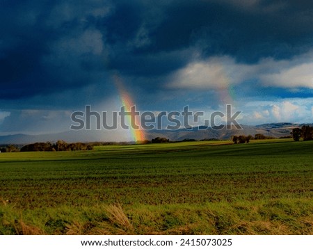 Picture of a Double Rainbow in the Fields