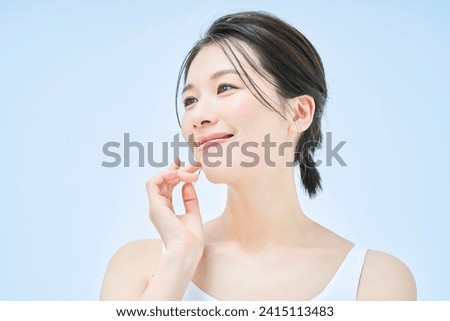 asian woman doing skin care