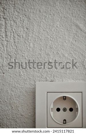 Power outlet on a wall shot with a dslr.