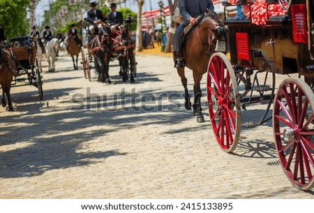 splendid horses with their carriages stroll happily through the streets of Seville's Feria de Abril

 Royalty-Free Stock Photo #2415133895