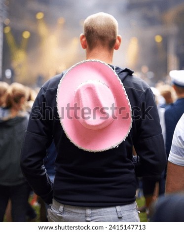 Man, crowd and music festival event audience or cowboy hat, rave outfit at party concert. Male person, back view and dj dancing night a social vacation for holiday relax experience, band to celebrate