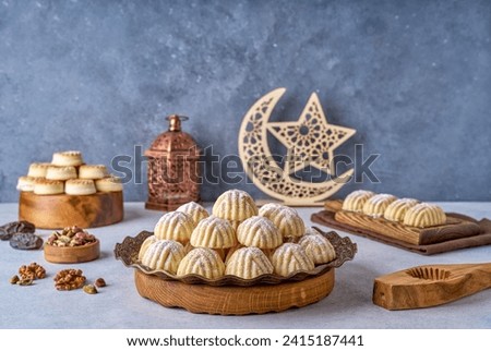 Assorted semolina maamoul or mamoul cookies with  ramadan decor. Traditional arabic Eid al Adha, Eid al Fitr sweets