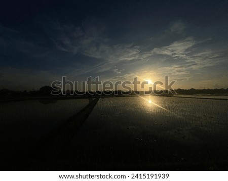 A picture of Sunset on the field