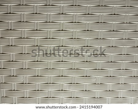 Abstract texture background, woven motif from white plastic