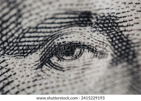 High Resolution Close-Up Macro Photography of Intricate Eye Detail on Currency Banknote for Enhanced Financial Security