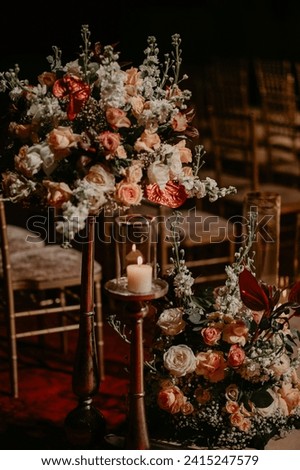 Decoration and serving of the festive table with autumn decor, candles and flowers.  stock photo