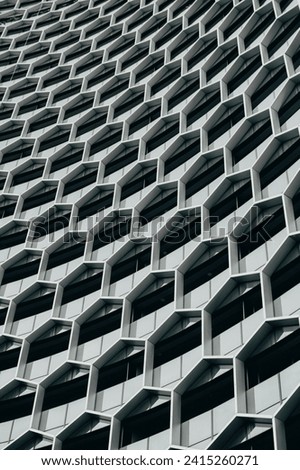 Sleek and modern, metallic textures exhibit the shine and reflectivity of metals like chrome, gold, or brushed aluminum. Royalty-Free Stock Photo #2415260271
