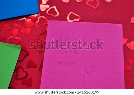 i love you write in colorful paper 