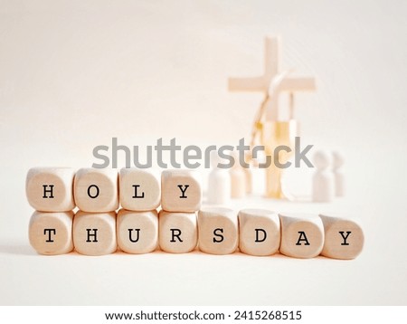 Lent Season, Holy Week and Maundy Thursday Concept - Holy Thursday text on wooden cubes background. Royalty-Free Stock Photo #2415268515