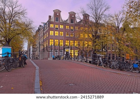 Amsterdam houses at twilight in the Netherlands at sunset