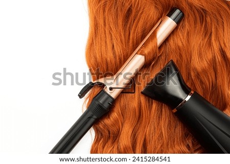 Long wavy red female hair Hair Dryer, Blow Dryer and Curling Iron on white isolated background. Coloring in bright colors. Mockup for design and advertising. Hair care.