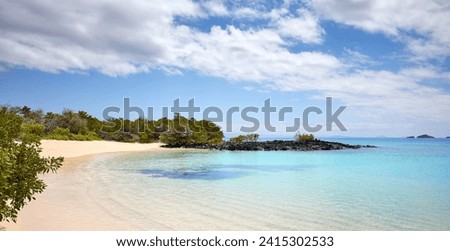 Pristine beach on an uninhabited island, Galapagos Islands, Ecuador. Royalty-Free Stock Photo #2415302533