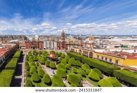 Mexico, tourist attractions and colorful streets and colonial houses in Leon historic center. Royalty-Free Stock Photo #2415311847
