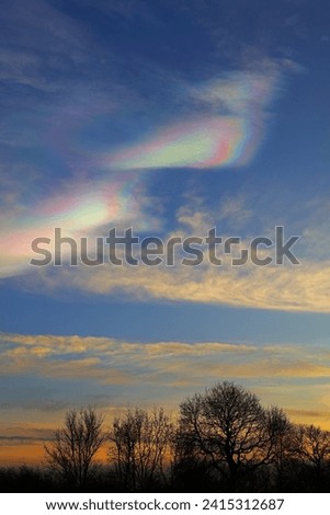 Cloudscape with rare Nacreous clouds at sunset near Ferryhill, County Durham England, UK. Royalty-Free Stock Photo #2415312687