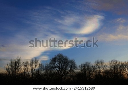 Cloudscape with rare Nacreous clouds at sunset near Ferryhill, County Durham England, UK. Royalty-Free Stock Photo #2415312689
