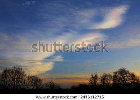 Cloudscape with rare Nacreous clouds at sunset near Ferryhill, County Durham England, UK. Royalty-Free Stock Photo #2415312715