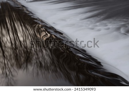 Abstract picture of waterfall during winter