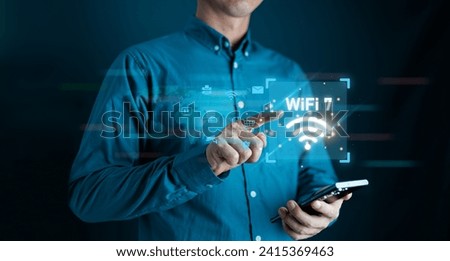 Close up of male hands using  cellphone with glowing digital brain hologram on blurry background. The concept of intelligence Royalty-Free Stock Photo #2415369463
