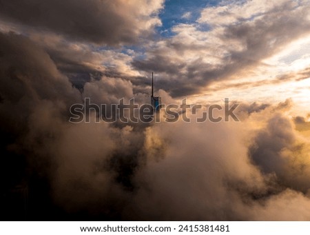 The 2nd tallest Skyscrappers looks majestic from an aerial view during the morning low cloud hours Royalty-Free Stock Photo #2415381481