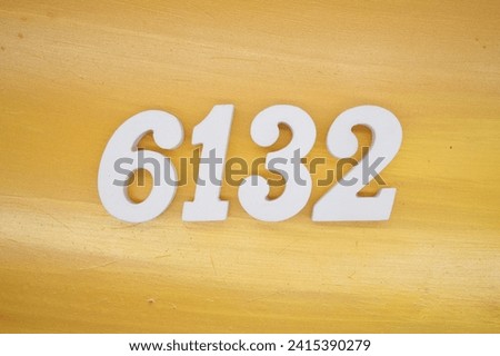 The golden yellow painted wood panel for the background, number 6132, is made from white painted wood.
