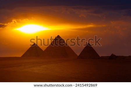 Giza Pyramid Complex at amazing sunset - Cairo, Egypt Royalty-Free Stock Photo #2415492869