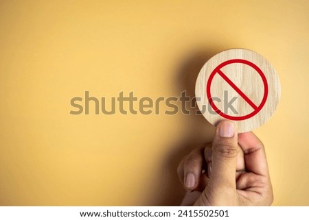 Prohibited signs icon on wood round wooden plank and copy space to be placed inside buildings, Safety, Pictogram, Danger, prohibition concept.