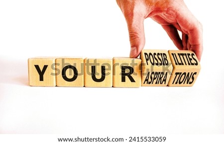 Your aspirations or possibilities symbol. Concept words Your aspirations or possibilities on wooden cubes. Beautiful white background. Business Your aspirations or possibilities concept. Copy space.