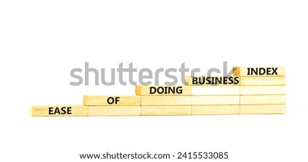 Ease of doing business index symbol. Concept words Ease of doing business index on wooden blocks. Beautiful white table white background. Business, ease of doing business index concept. Copy space.