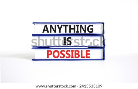Anything is possible symbol. Concept words Anything is possible on beautiful books. Beautiful white table white background. Business anything is possible concept. Copy space.