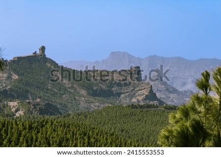Breathtaking View To Roque Nublo And Roque Bentayga - The Two Holy Mountains For Tor The Indigenious Inhabitants Of Gran Canaria Royalty-Free Stock Photo #2415553553