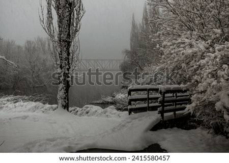 Snowy landscape at Soria, Spain. Winter season. Beautiful landscape. Snow. Douro river banks. Train bridge at the back of the picture.