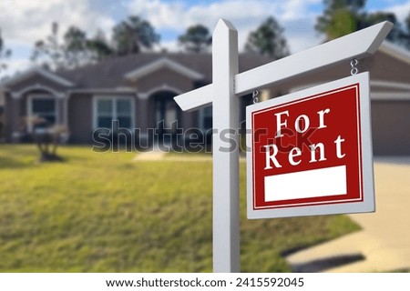 Home for rent. Sign in front of new home