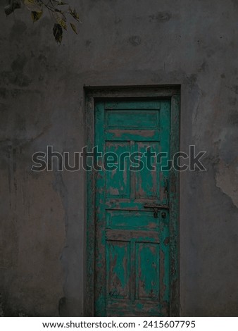 Explore the allure of yesteryear with our captivating stock photo featuring an old aesthetic door. 