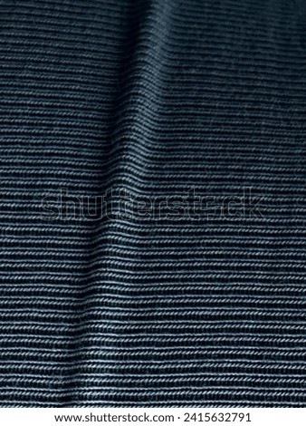 Cotton with stretch material texture. Close picture with pattern seen. Blue grey color of cloth