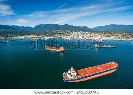 Aerial image of transport ships anchored in Vancouver, BC, Canada