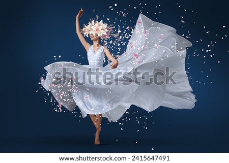 Ballet dancer leaping with grace, adorned in a long white dress and a delicate flower crown. Perfect for conveying elegance, beauty, and the joy of dance. Ideal for dance-related promotions, artistic  Royalty-Free Stock Photo #2415647491
