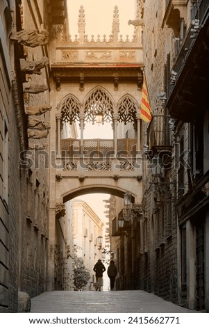 Famous Bridge at Carrer del Bisbe in Gothic Quarter at Bishop Street, Barcelona, Spain Royalty-Free Stock Photo #2415662771